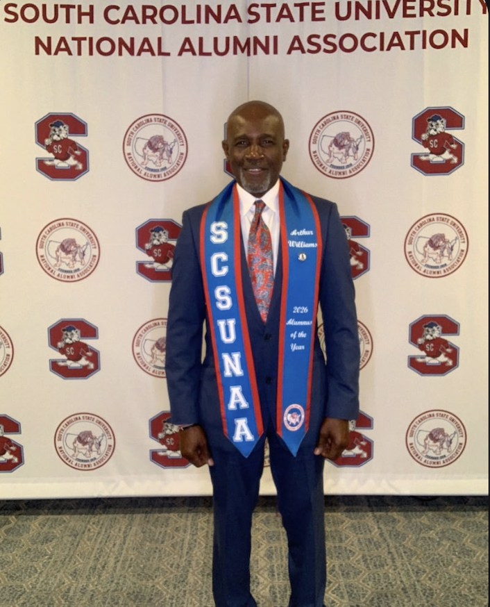 Art Williams wearing the SCSUNAA Outstanding Alumnus of the Year sash at the South Carolina State University National Alumni Association banquet