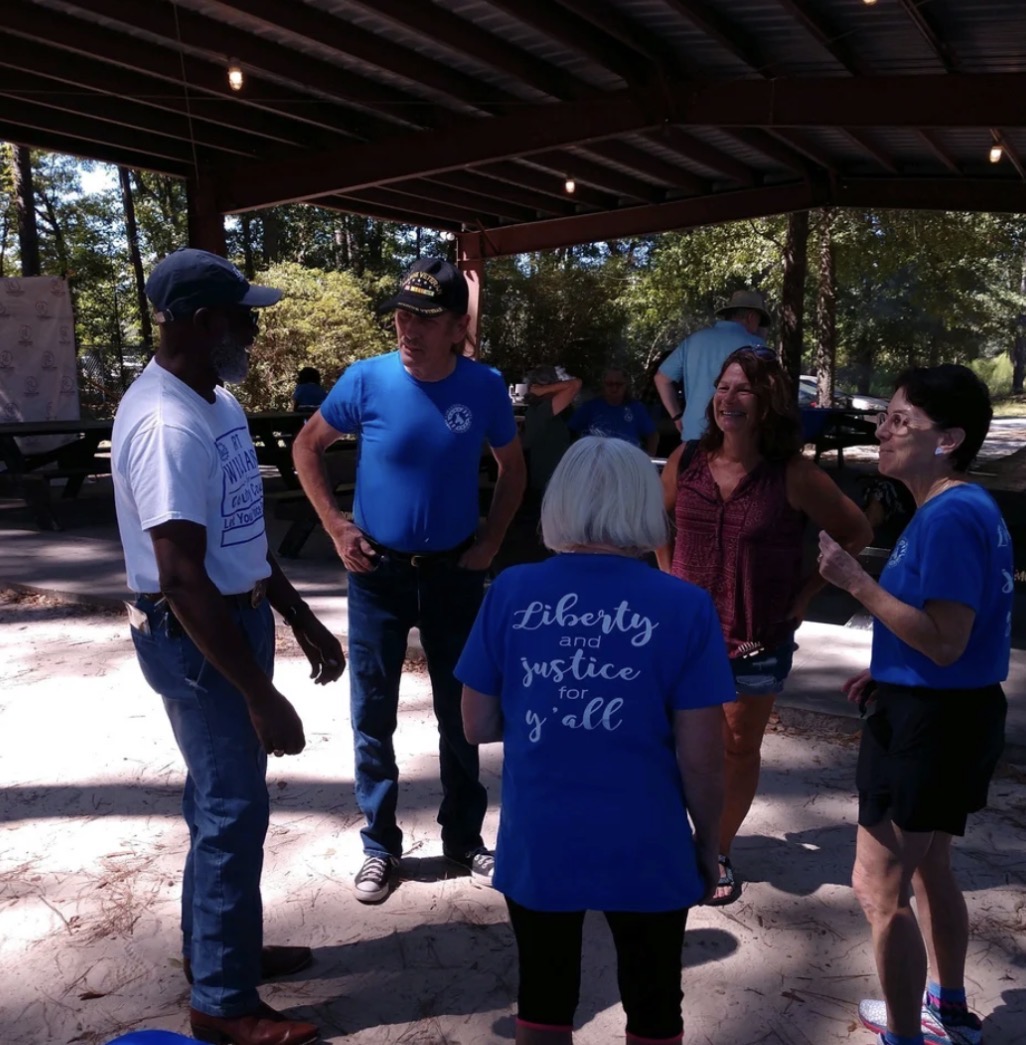 Lowcountry community gathering under live oaks